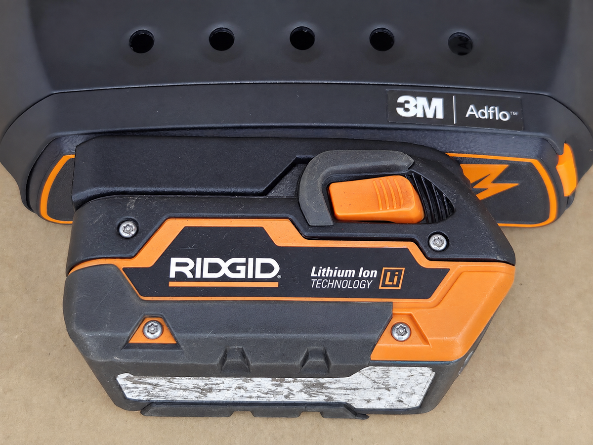 RIDGID AEG 18V Adflo battery adapter - RIDGID Max Select pack slid in - front view