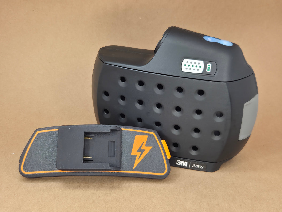 DeWalt 12V MAX Adflo adapter - adapter plate beside the perforated blower housing - detail view
